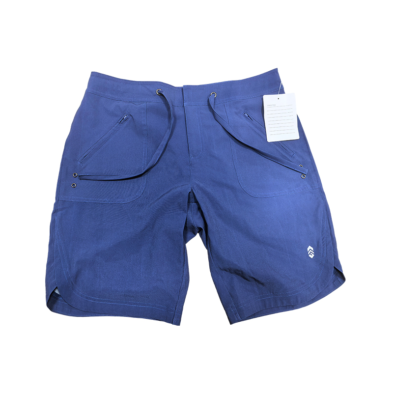 Why are beach shorts a model of convenient storage and casual wear?